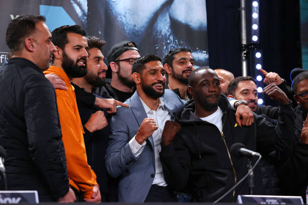 Amir Khan is poses for a photograph with his team after a BOXXER press conference ahead of his fight against Kell Brook at Manchester Central...