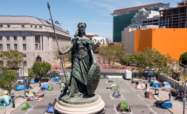 An aerial view shows a statue of Eureka, part of the Pioneer Monument, standinb above squares painted on the ground to encourage homeless people to...