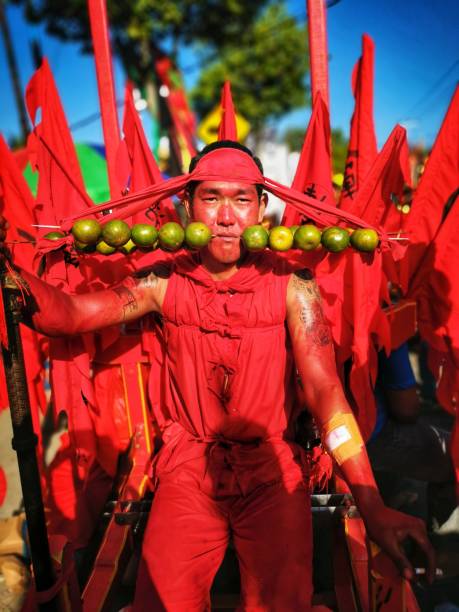An unknown male Tatung or Shaman attending a Chap Goh Meh parade marking the end of Chinese New Year in Singkawang City, Indonesia