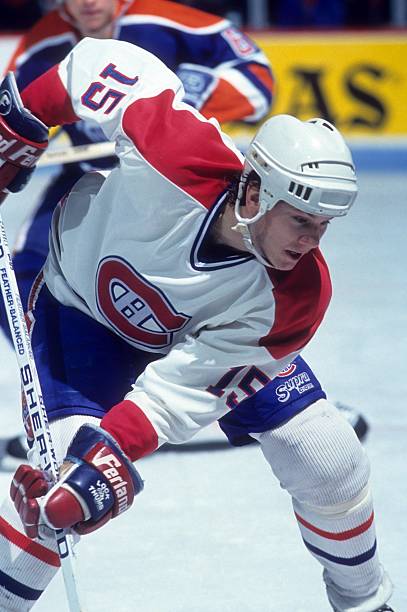 andrew-cassels-of-the-montreal-canadiens-takes-the-faceoff-during-an-picture-id474241254