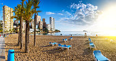 anoramic seascape view of summer resort with beach(Playa de Llevant) and famous skyscrapers. Costa Blanca. City of Benidorm, Alicante, Valencia, Spain.