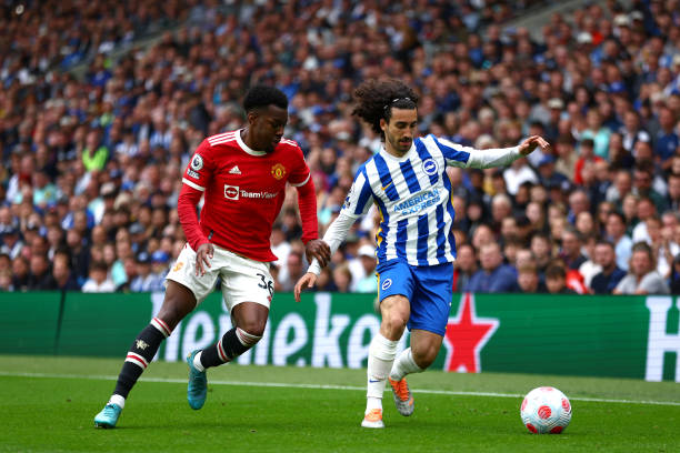 Anthony Elanga of Manchester United battles for possession with Marc Cucurella of Brighton & Hove Albion during the Premier League match between...