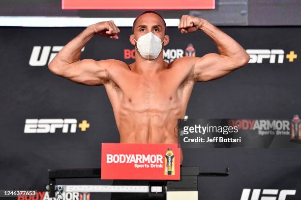 anthony-rocco-martin-poses-on-the-scale-during-the-ufc-250-weighin-at-picture-id1246377653