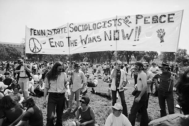 AntiVietnam War protesters in Washington DC hold a banner that reads Sociologists for Peace during a demonstration for the students killed at Kent...