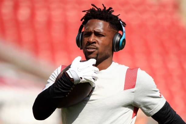 Antonio Brown of the Tampa Bay Buccaneers warms up prior to the game against the Miami Dolphins at Raymond James Stadium on October 10, 2021 in...