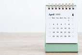 April 2022 desk calendar on white.