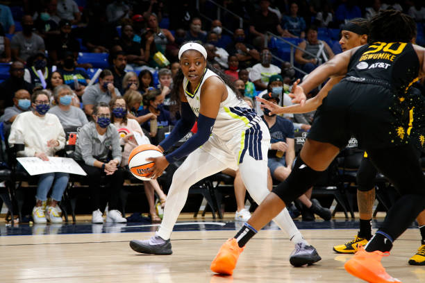 Arike Ogunbowale of the Dallas Wings handles the ball during the game against the Los Angeles Sparks on September 19, 2021 at College Park Center in...