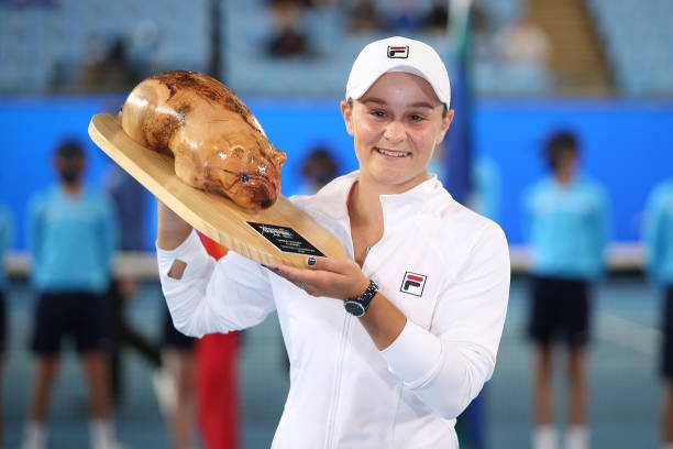 Ashleigh Barty of Australia poses with the Yarra Valley Classic trophy after winning her Women's Singles Final match against Garbine Muguruza of...