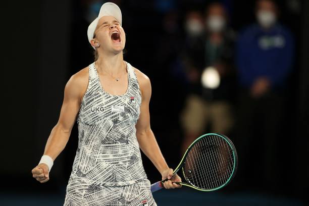 Australia's Ashleigh Barty celebrates after winning womens singles final match against Danielle Collins of the US on day thirteen of the Australian...
