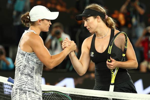 Australia's Ashleigh Barty shakes hands with Danielle Collins of the US after their womens singles final match on day thirteen of the Australian Open...