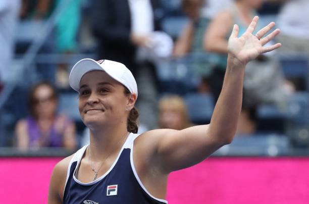 Australia's Ashleigh Barty waves to the crowd after defeating Russia's Vera Zvonareva during their 2021 US Open Tennis tournament women's singles...