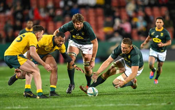 Australia's Tevita Kuridrani and South Africa's Rynhardt Elstadt try to grab the ball during the 2019 Rugby Championship match South Africa v Australia, at the Emirates Airline Park in Johannesburg, on July 20, 2019. (Photo by Christiaan Kotze / AFP) (Photo by CHRISTIAAN KOTZE/AFP via Getty Images)
