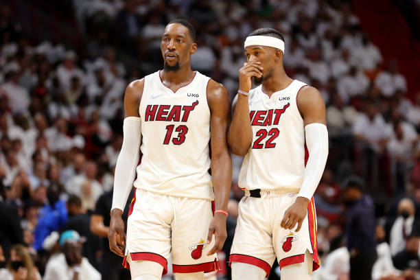 Bam Adebayo and Jimmy Butler of the Miami Heat talk during the second quarter against the Boston Celtics in Game Two of the 2022 NBA Playoffs Eastern...