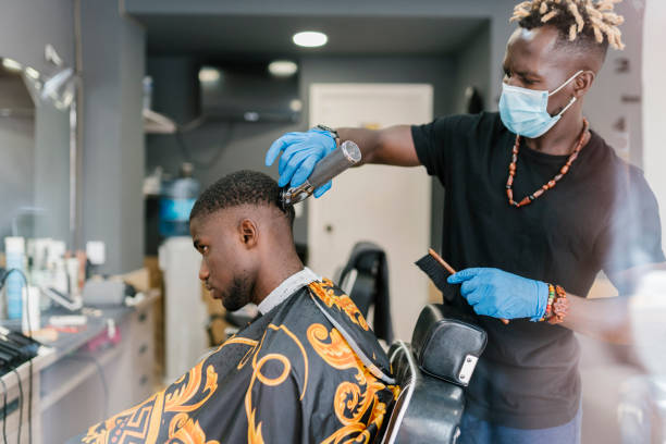 barber with locs wearing mask and glove while cutting customers hair picture id1266059398?k=20&m=1266059398&s=612x612&w=0&h=9CcGDkAOV7dK5SG41EzQc7la555QNs osk4P90ebvfk=