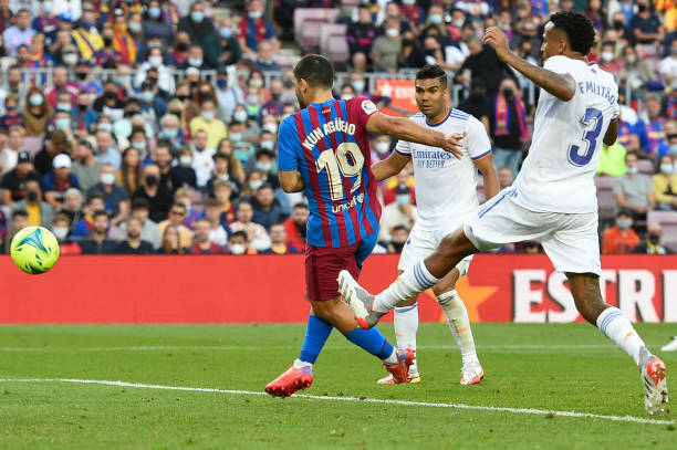 Barcelona's Argentinian forward Kun Aguero scores a goal during the Spanish League football match between FC Barcelona and Real Madrid CF at the Camp...