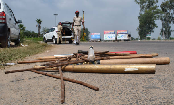 Baseball bats hockey sticks and iron rods recovered by cops during checking the vehicles at a naka at intersection of Airport road and Patiala road...