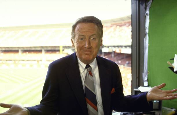 Playoffs: Portrait of Los Angeles Dodgers and NBC announcer Vin Scully in the press box before Game 4 between St. Louis Cardinals and San Francisco...