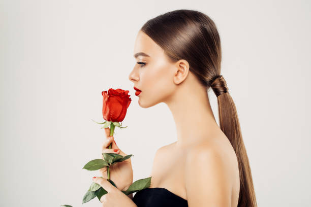 beautiful-girl-with-red-rose-picture-id873188938