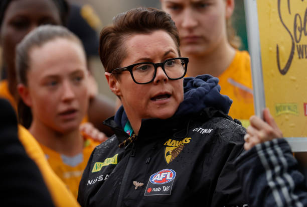 Bec Goddard, Senior Coach of the Hawks addresses her players during the 2022 S7 AFLW Round 04 match between the Hawthorn Hawks and the Carlton Blues...