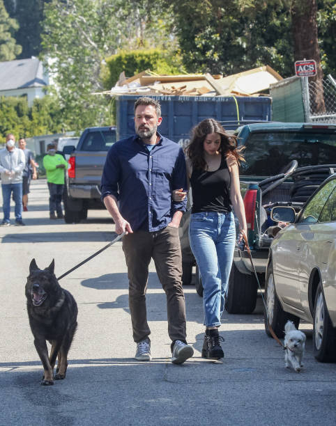 Ben Affleck and Ana de Armas walk their dogs on April 01 2020 in Los Angeles California