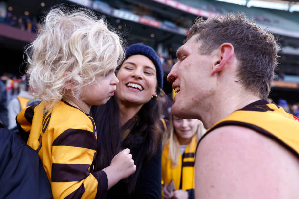 Ben McEvoy of the Hawks greets his son Clancy in the crowd after the round 18 AFL match between the Hawthorn Hawks and the West Coast Eagles at...