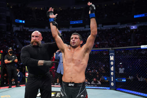 Beneil Dariush reacts after defeating Tony Ferguson in their lightweight bout during the UFC 262 event at Toyota Center on May 15, 2021 in Houston,...