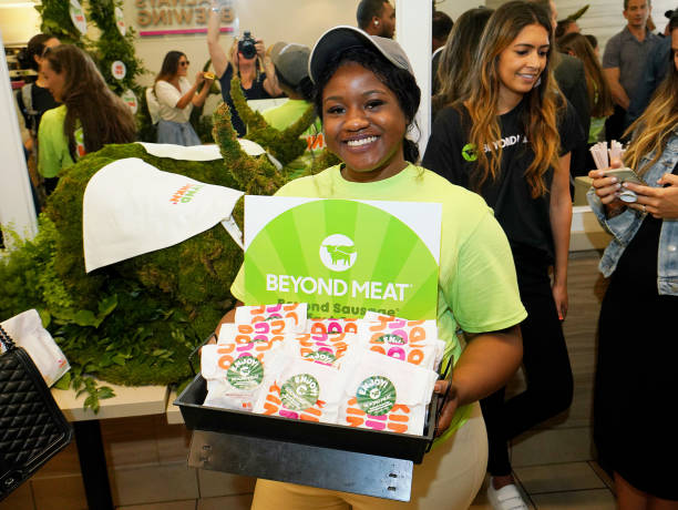 Beyond Sausage Breakfast Sandwiches are served during Dunkin' and Beyond Meat unveil Beyond Sausage Breakfast Sandwich at an event hosted by DeAndre...