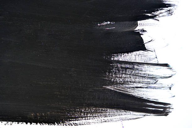 black brush strokes on white paper