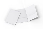Blank white reinforced pocket folders on isolated white background, mock up template for design presentation. 3d illustration