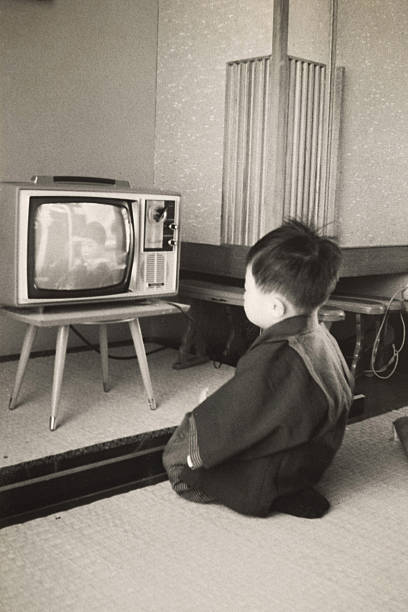Boy watching television program