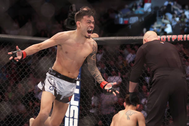 Brandon Royval celebrates after his victory over Matt Schnell in their flyweight bout during UFC 274 at Footprint Center on May 07, 2022 in Phoenix,...