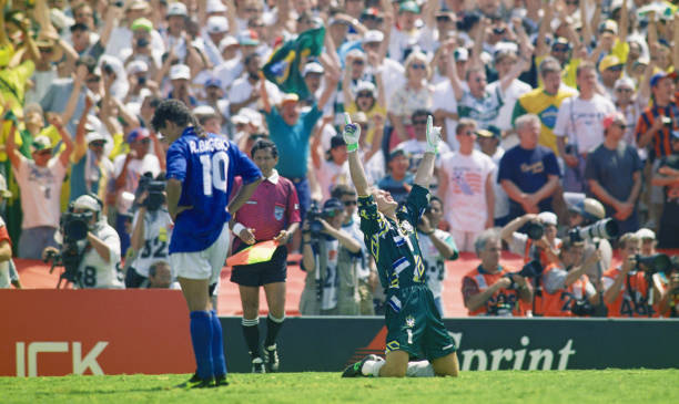 Brazil goalkeeper Taffarel celebrates after Roberto Baggio of Italy had missed his penalty to decide the FIFA World Cup Final 1994 between Brazil and...