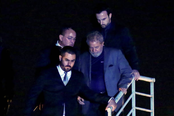 Brazilian expresident Luiz Inacio Lula da Silva arrives at the Federal Police headquarters where he is due to serve his 12year prison sentence in...