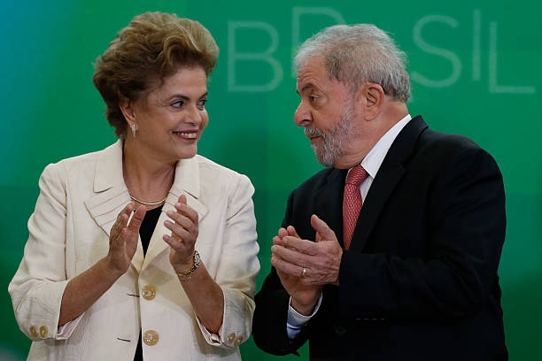 Brazil's former president Luiz Inacio Lula da Silva is sworn in as the new chief of staff for embattled President Dilma Rousseff on March 17 2016 in...
