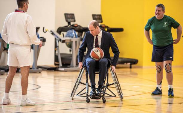 Britain's Prince William Duke of Cambridge tries playing wheelchair basketball during his visit to the Defence Medical Rehabilitation Centre in...