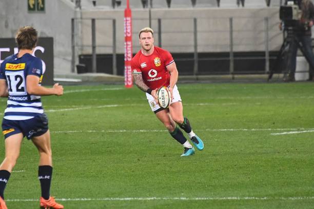British and Irish Lions' captain and full back Stuart Hogg kicks the ball during the rugby union tour match between Stormers and the British and Irish Lions at The Cape Town Stadium in Cape Town on July 17, 2021. (Photo by RODGER BOSCH / AFP) (Photo by RODGER BOSCH/AFP via Getty Images)