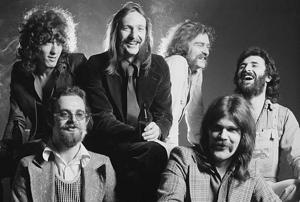 British folk rock group, Lindisfarne, May 1974. Left to right: drummer Paul Nichols, keyboard player Kenny Craddock , singer Alan Hull , guitarist...