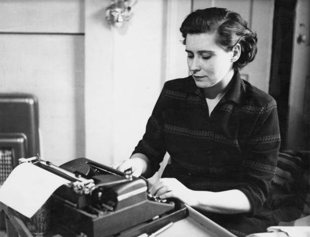 British poet, novelist and playwright Doris Lessing working at a typewriter, circa 1950.