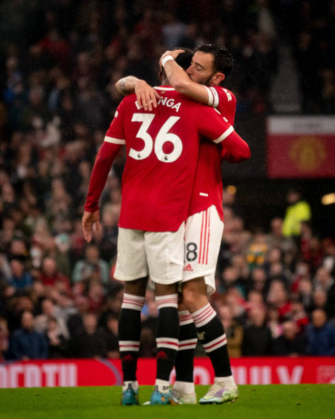 Bruno Fernandes of Manchester United celebrates scoring a goal to make the score 1-0 with Anthony Elanga during the Premier League match between...