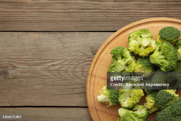 bunch fresh green broccoli cutting board