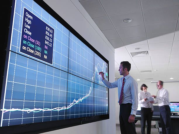 businessman using graphs on screen picture