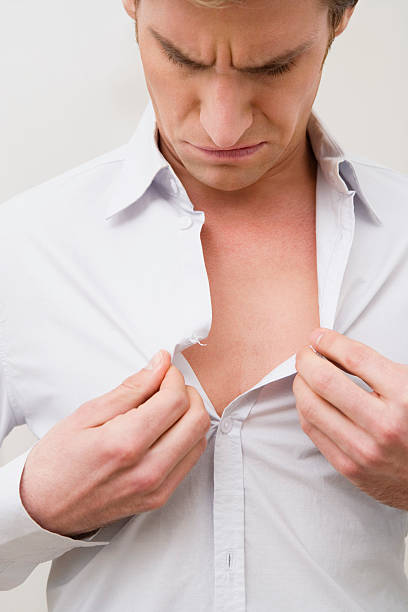 button missing of man's shirt - missing button shirt stock pictures, royalty-free photos & images