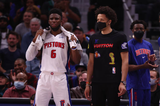 Cade Cunningham and Hamidou Diallo of the Detroit Pistons look on while playing the Chicago Bulls at Little Caesars Arena on October 20, 2021 in...