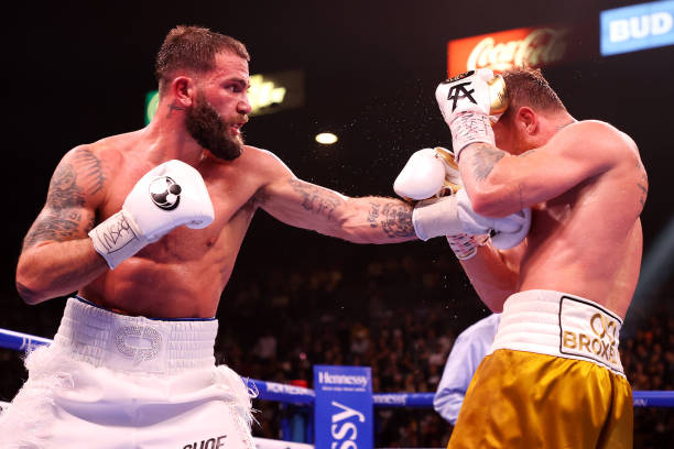 Caleb Plant punches Canelo Alvarez during their championship bout for Alvarez's WBC, WBO and WBA super middleweight titles and Plant's IBF super...