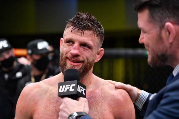 Calvin Kattar reacts after his victory over Giga Chikadze of Georgia in their featherweight fight during the UFC Fight Night event at UFC APEX on...
