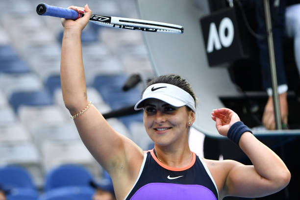 Canada's Bianca Andreescu celebrates beating Romania's Mihaela Buzarnescu in their women's singles match on day one of the Australian Open tennis...