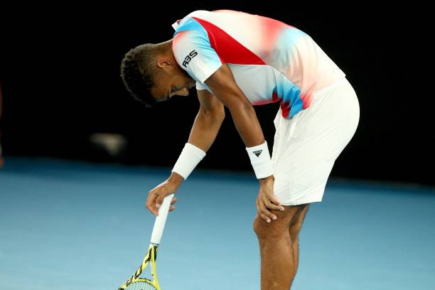 Canada's Felix Auger-Aliassime reacts after loosing a point against Russia's Daniil Medvedev during their men's singles quarter-final match on day...