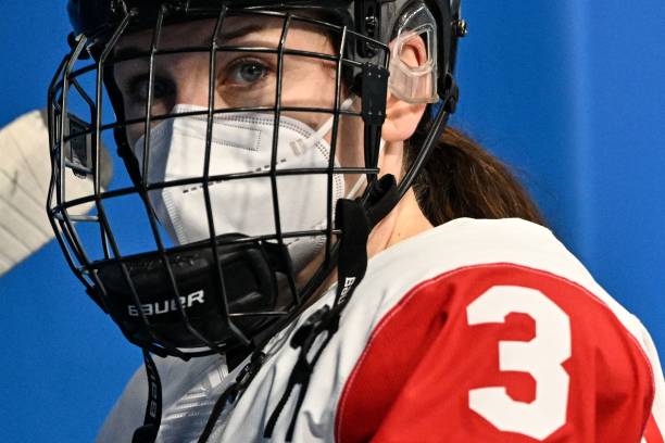 Canada's Jocelyne Larocque reacts during the women's preliminary round group A match of the Beijing 2022 Winter Olympic Games ice hockey competition...