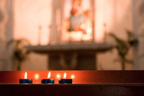 candles infront of altar - good friday stockfoto's en -beelden