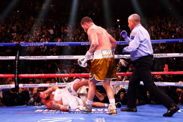 Canelo Alvarez knocks out Caleb Plant in the 11th round during their championship bout for Alvarez's WBC, WBO and WBA super middleweight titles and...